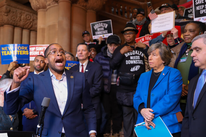 State Senator Zellnor Myrie speaks at a rally in Albany protesting the potential closure of SUNY Downstate.