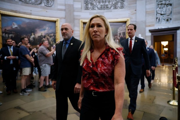 House Homeland Security Committee members (L-R) Rep. Clay Higgins (R-LA), Rep. Marjorie Taylor Greene (R-GA), Rep. August Pfluger (R-TX) and their fellow Republican impeachment managers walk back through the U.S. Capitol Rotunda after transmitting articles of impeachment against Homeland Security Secretary Alejandro Mayorkas to the Senate on April 16, 2024 in Washington, DC. (Chip Somodevilla/Getty Images)