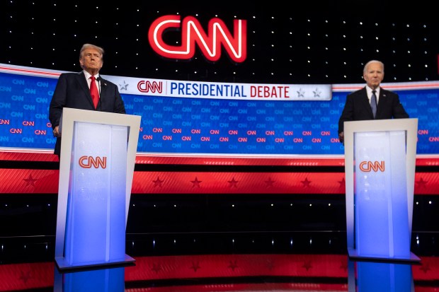 US President Joe Biden and former US President and Republican presidential candidate Donald Trump participate in the first presidential debate of the 2024 elections at CNN's studios in Atlanta, Georgia, on June 27, 2024. (Photo by CHRISTIAN MONTERROSA/AFP via Getty Images)