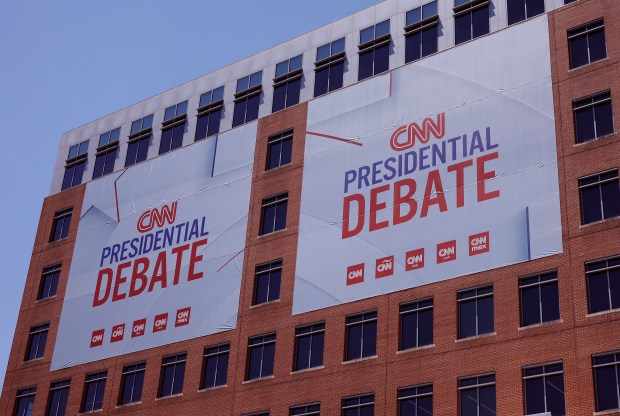 Signs advertising the presidential debate hosted by CNN are seen outside of their studios on June 25, 2024 in Atlanta, Georgia. U.S. President Joe Biden and Republican presidential candidate former President Donald Trump will face off in the first presidential debate of the 2024 presidential cycle this Thursday. (Kevin Dietsch/Getty Images)